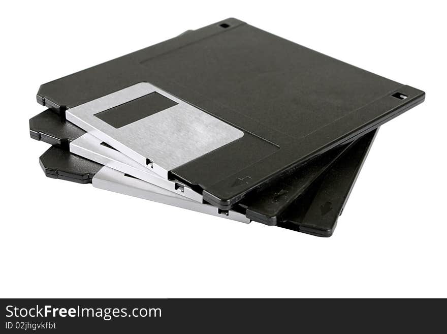 Old black floppy disk on a white background. Old black floppy disk on a white background