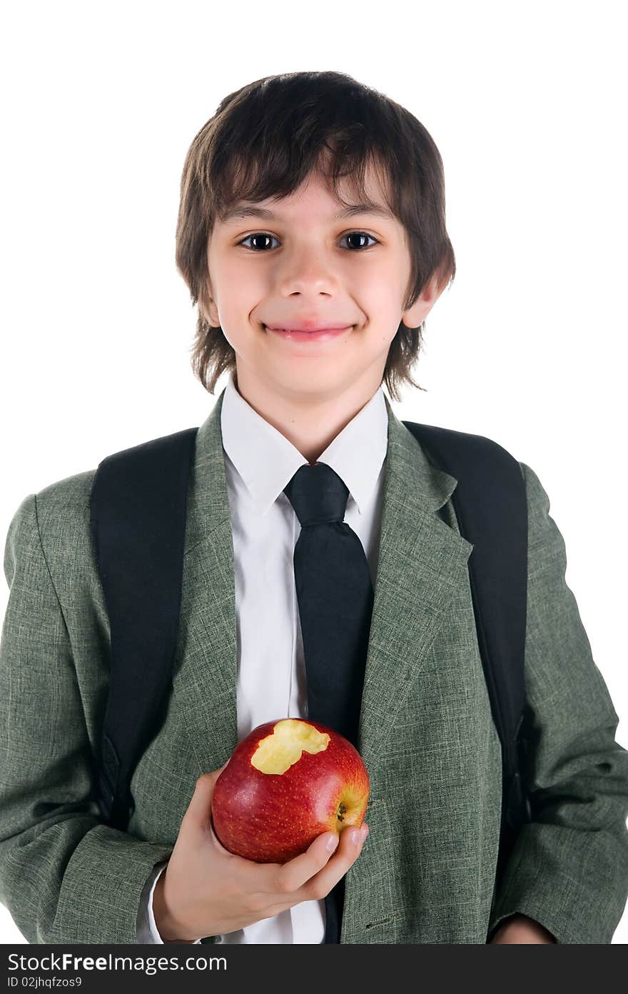 Little boy in bussiness style with the apple on white background