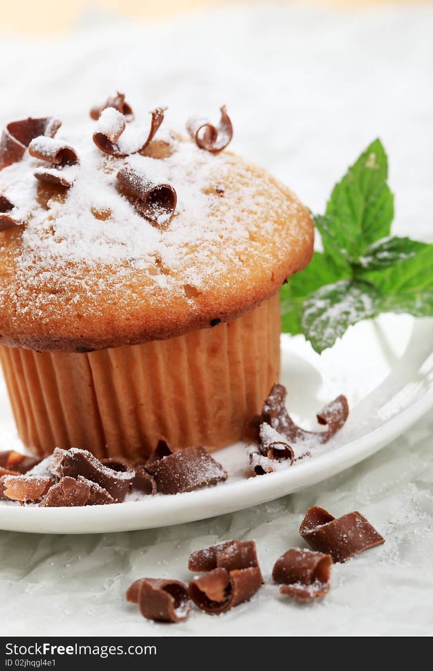 Muffin topped with chocolate shavings