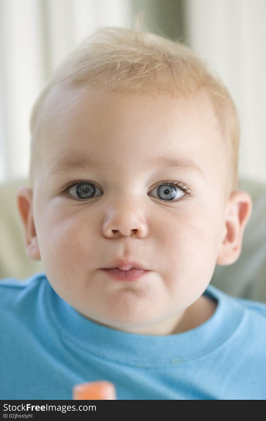 A young baby looking startled. A young baby looking startled.