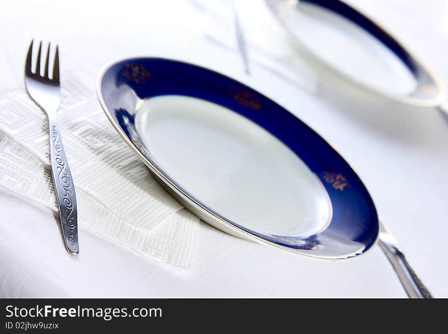 Plate And Fork On Table