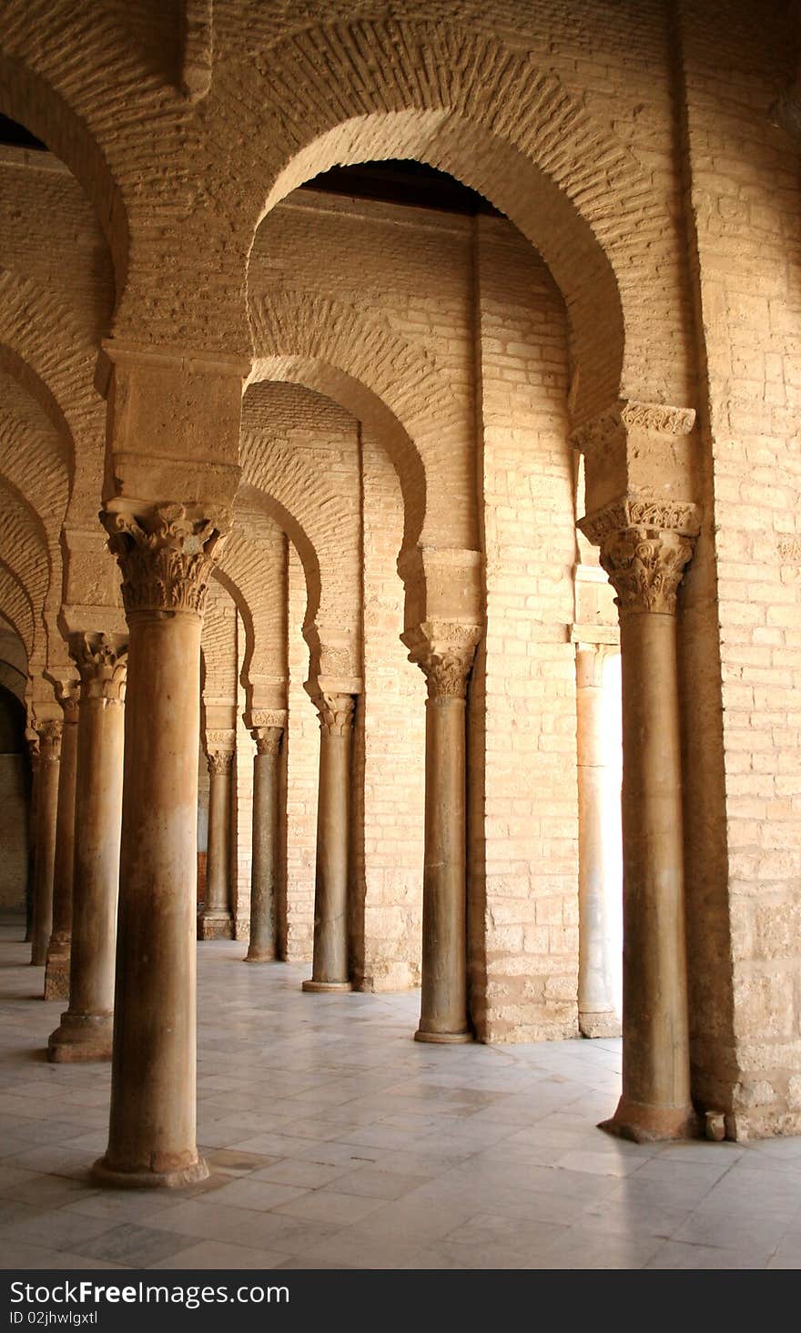 Columns infront the entrance to the Great mosque in Kairuan in Tunisia. Columns infront the entrance to the Great mosque in Kairuan in Tunisia