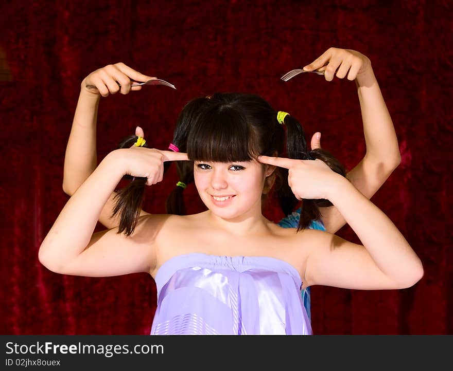 Lovely teen girl on dark background