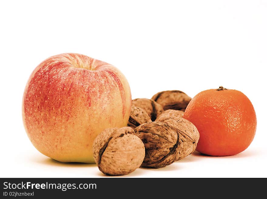 Apple, orange and walnuts