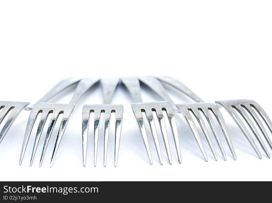 Group of Forks from the aged metal. Isolated on white