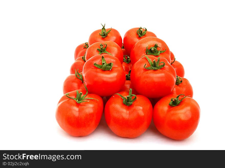 Fresh ripe red tomato on white background. Fresh ripe red tomato on white background