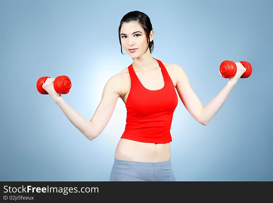 Girl with dumbbells