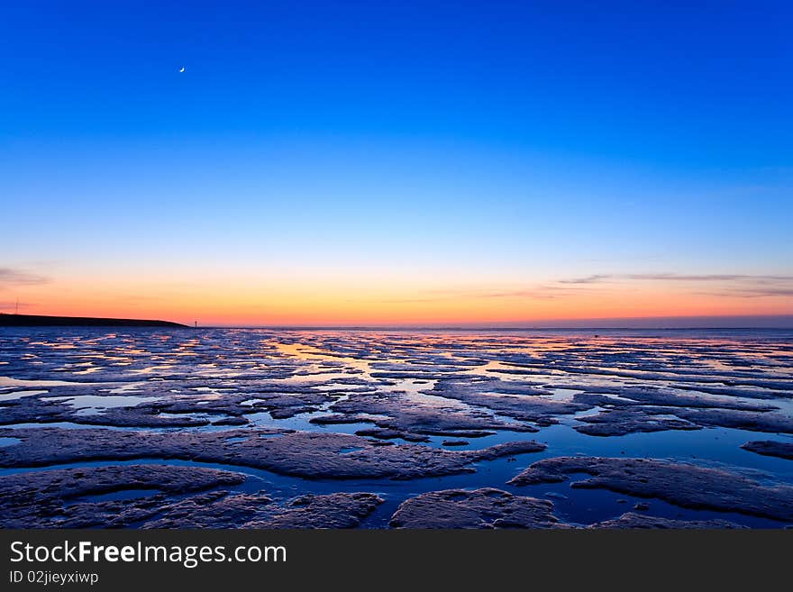 Reflection Of The Sunset In The Ocean