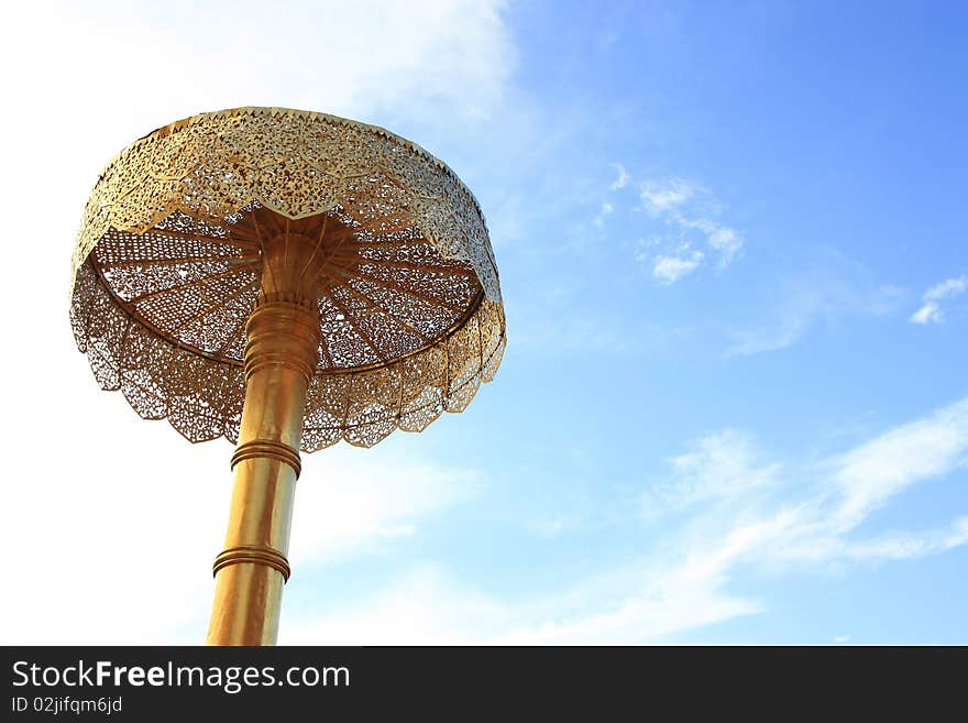 The ancient brass and blue sky