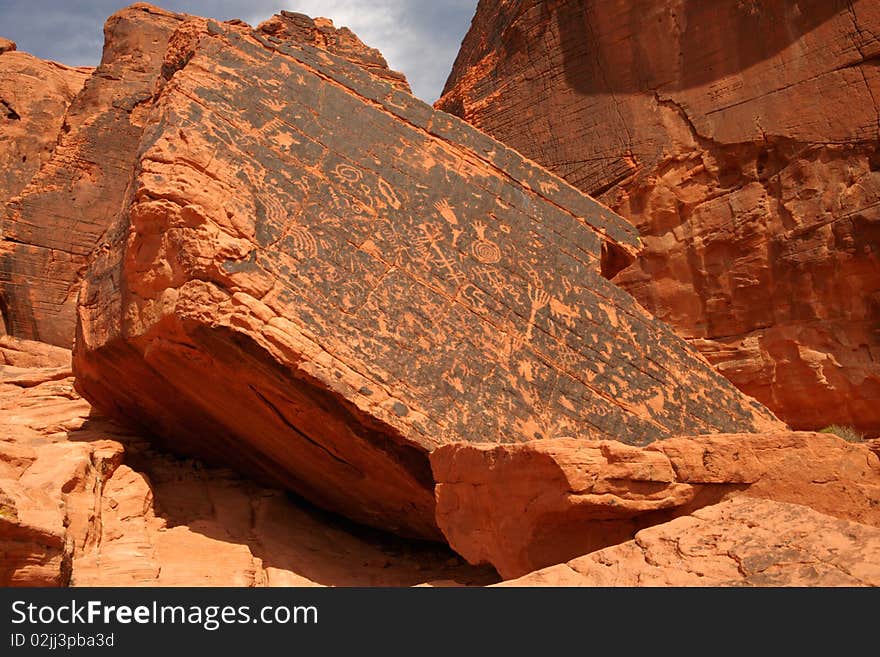 Petroglyphs on rock in the Valley Of Fire State Park. Petroglyphs on rock in the Valley Of Fire State Park