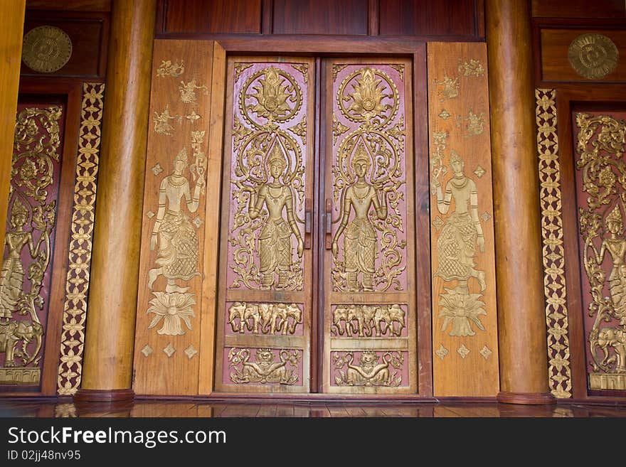 Thai style door in lao temple