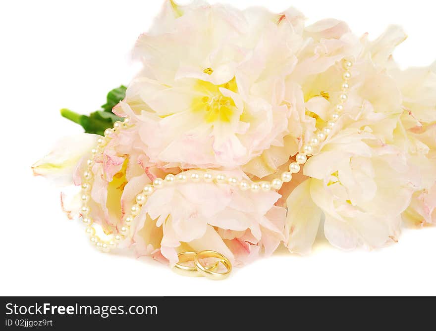 Nice pink peony tulip with wedding gold rings and pearl isolated on the white. Good image for invitation. Nice pink peony tulip with wedding gold rings and pearl isolated on the white. Good image for invitation.