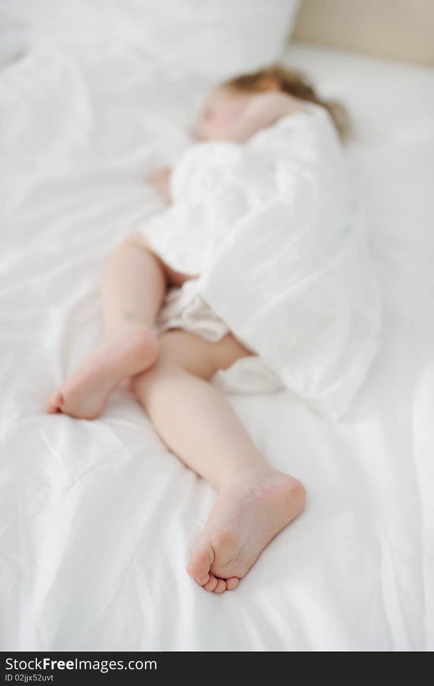 Adorable toddler girl s little feet