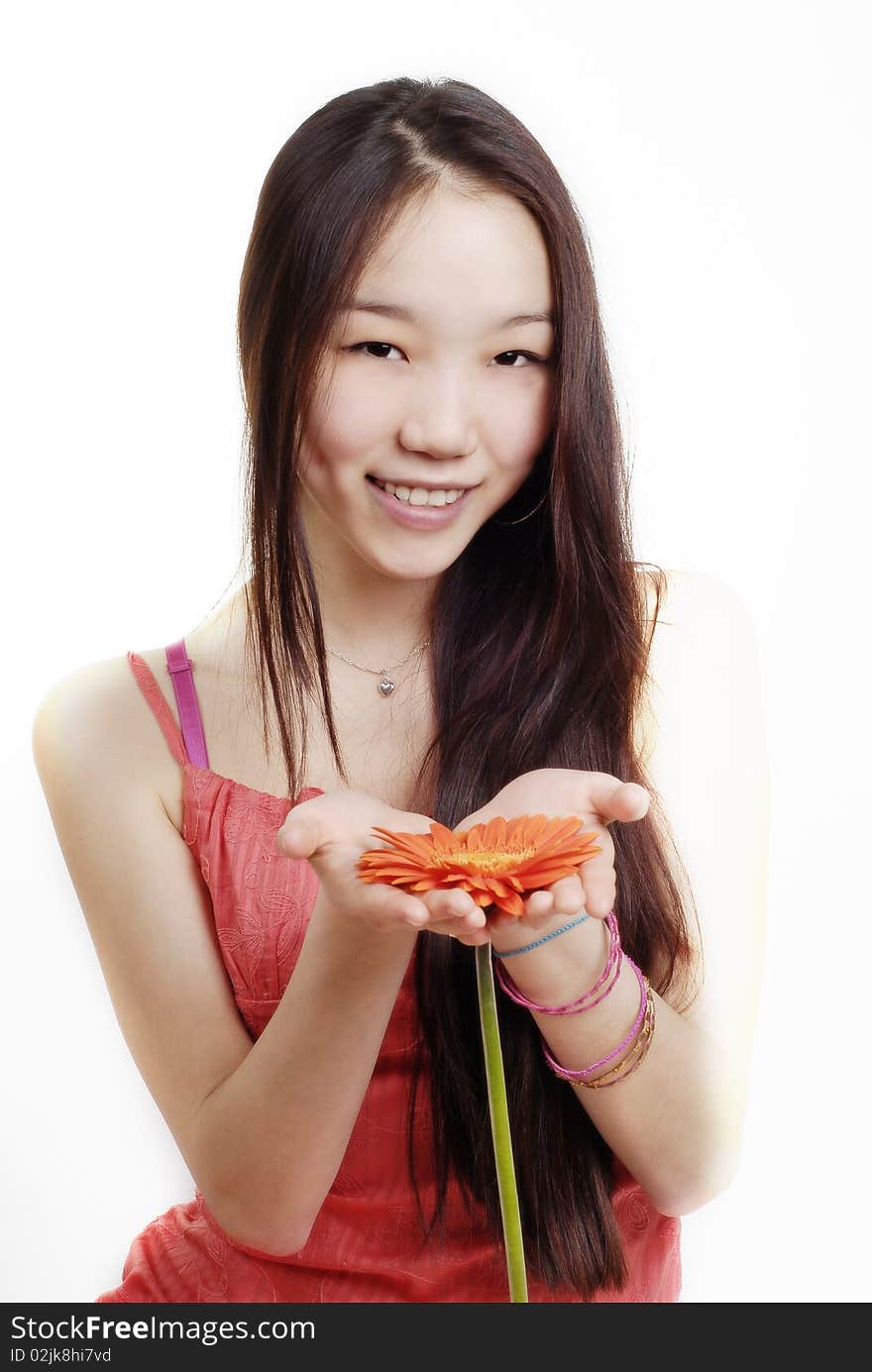 Girl in a red dress with flower. Girl in a red dress with flower