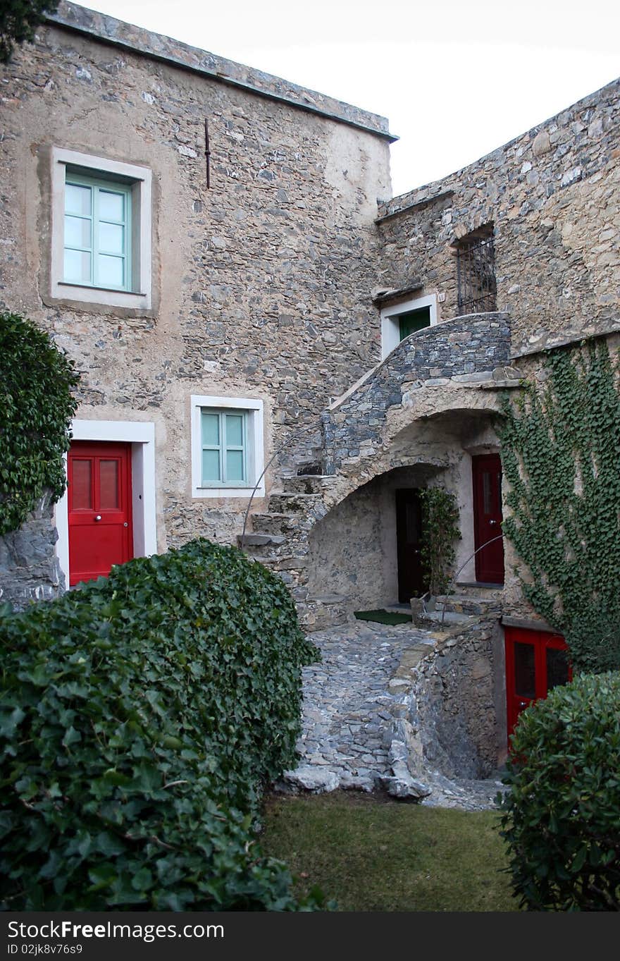 Stone house and courtyard in an italian village