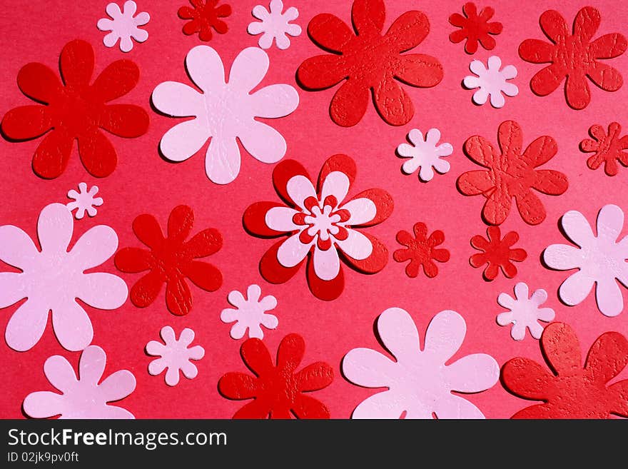 Red and pink paper flowers background. Red and pink paper flowers background