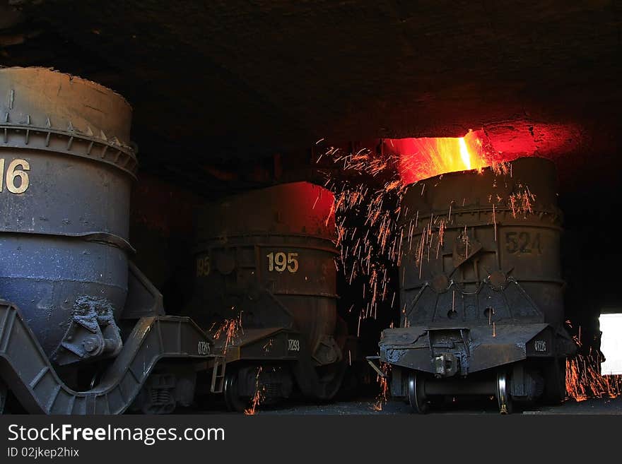 Liquid iron from the smelting stove. Liquid iron from the smelting stove.