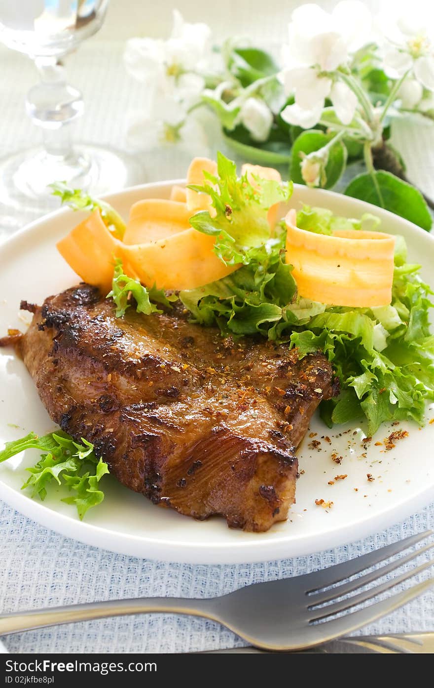 Close-up of juicy tenderloin beef covered in pepper. Close-up of juicy tenderloin beef covered in pepper