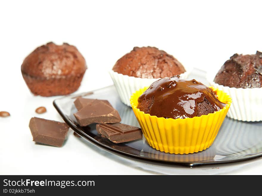 Chocolate muffins with coffee beans and chocolate