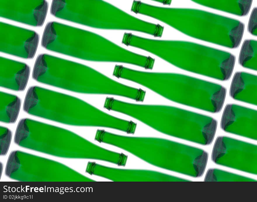 A green glass bottle on a white background. A green glass bottle on a white background.