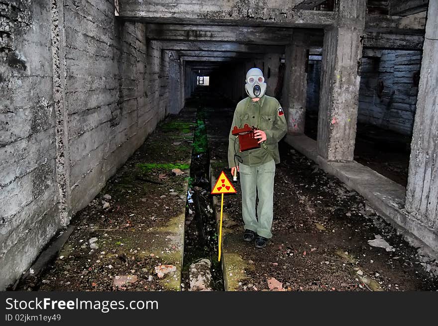 Teenager weared American military uniform.Lost city. Near Chernobyl area. Modern ruins. Ukraine. Kiev region. Teenager weared American military uniform.Lost city. Near Chernobyl area. Modern ruins. Ukraine. Kiev region