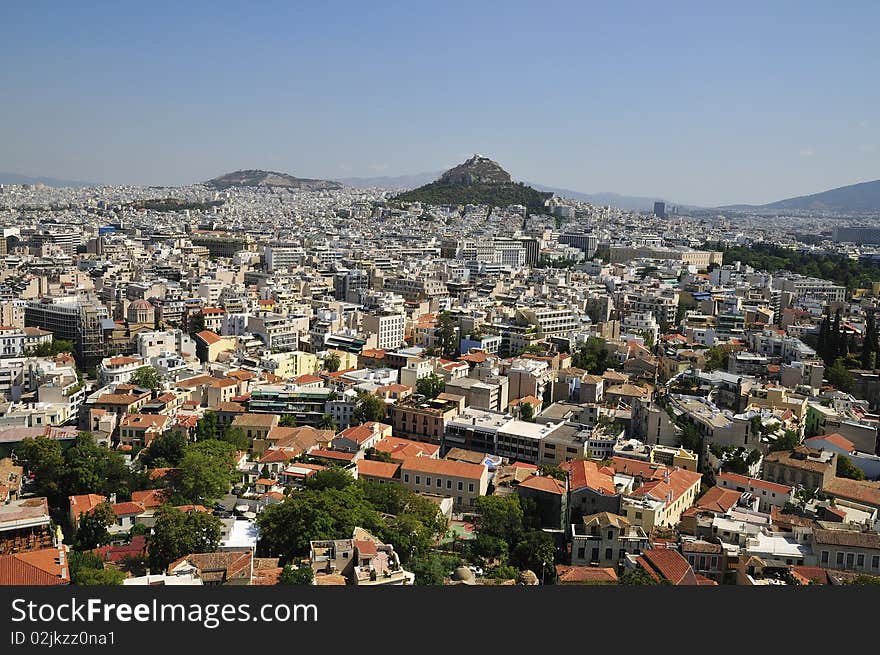 Overall view on Athens with tops Acropolis