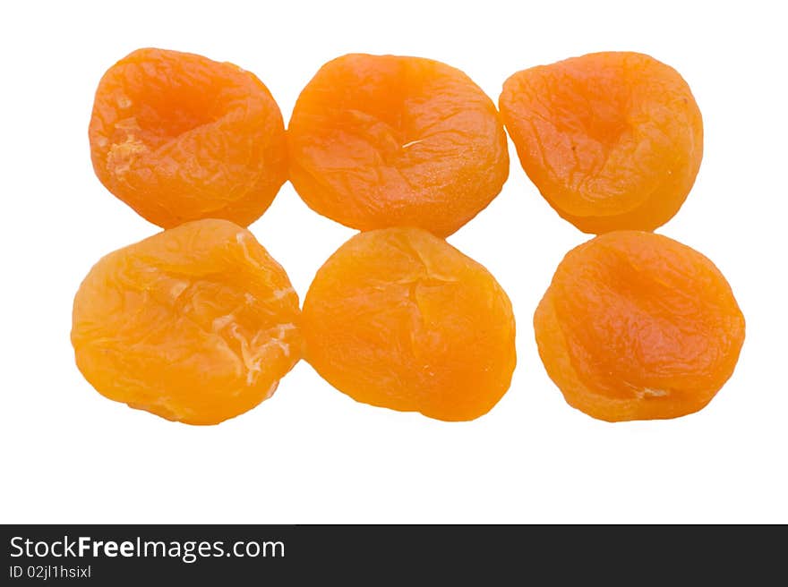 Dried apricots on a white background