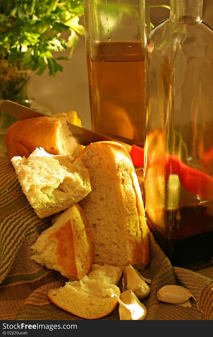 Crusty bread with garlic, olive oil, balsamic vinegar and parsley. Crusty bread with garlic, olive oil, balsamic vinegar and parsley