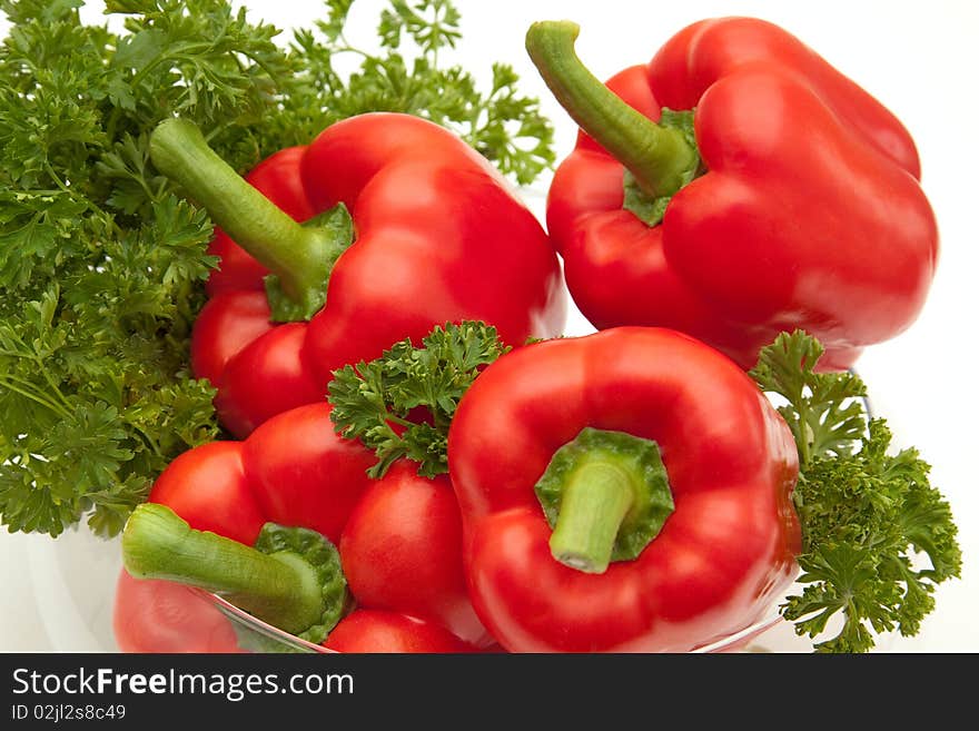 A group of Red Bell Peppers with parsley