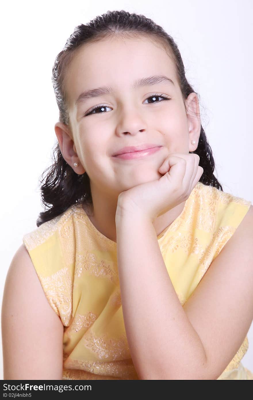 Girl smiling and looking at the camera isolated on white. Girl smiling and looking at the camera isolated on white