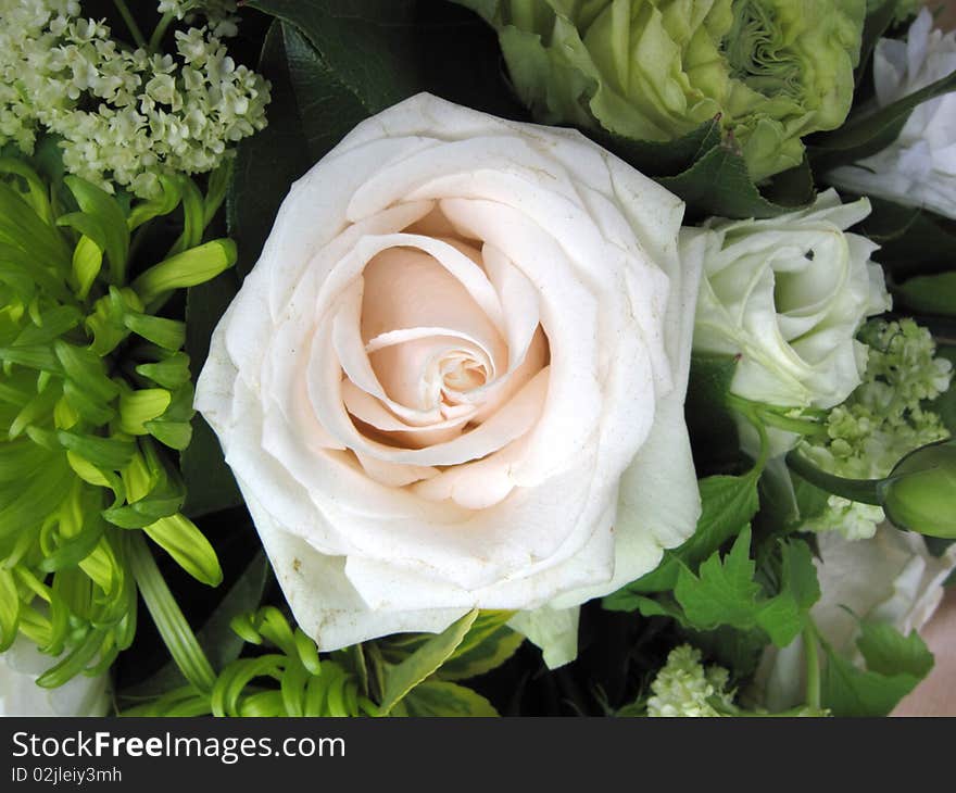 Beautiful bouquet of white roses and assorted flowers