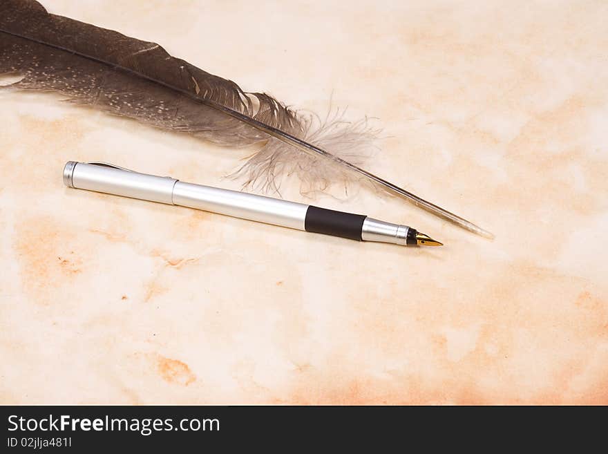 Feather and silver pen