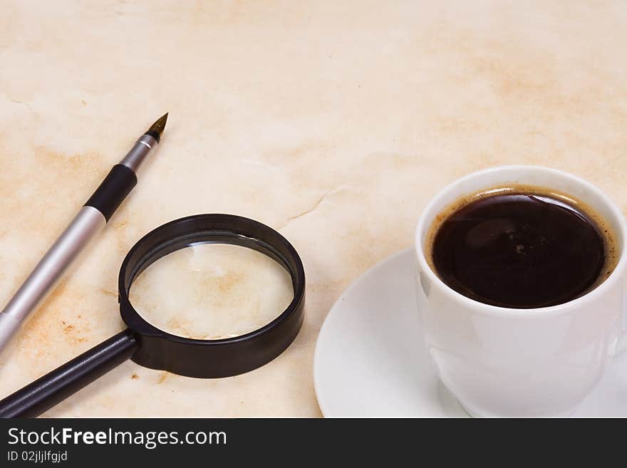 Magnifying glass and coffee at texture