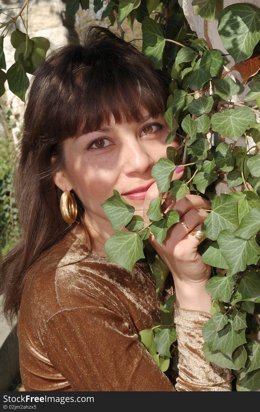 Portrait of beautiful woman in park