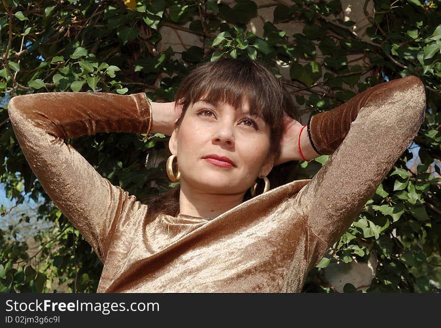 Portrait Of Beautiful Woman In Park