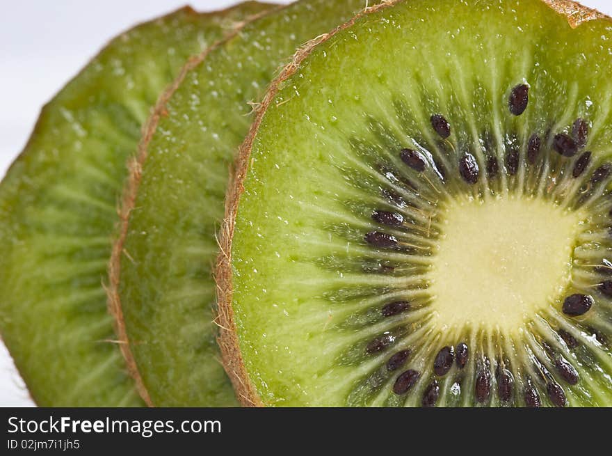 Sliced kiwi on white background. Sliced kiwi on white background