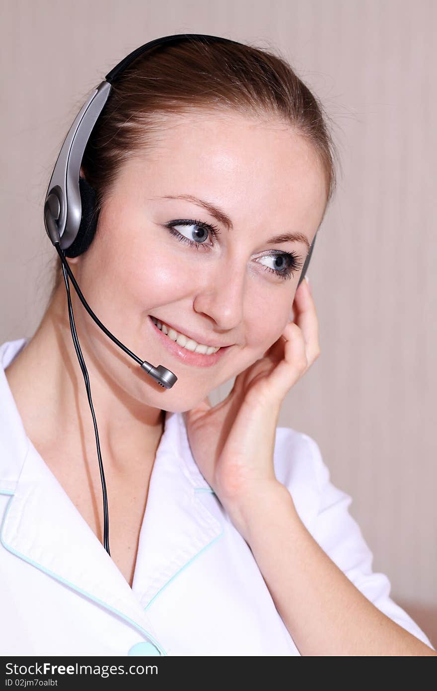 Close-up face of smiling woman in headphones