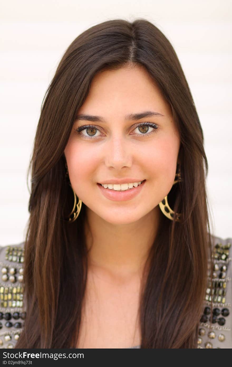 Portrait of young happy smiling woman, isolated on white