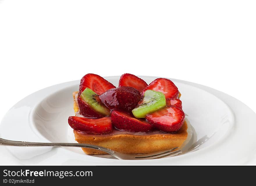 Strawberry cake with kiwi on Plate isolated on White