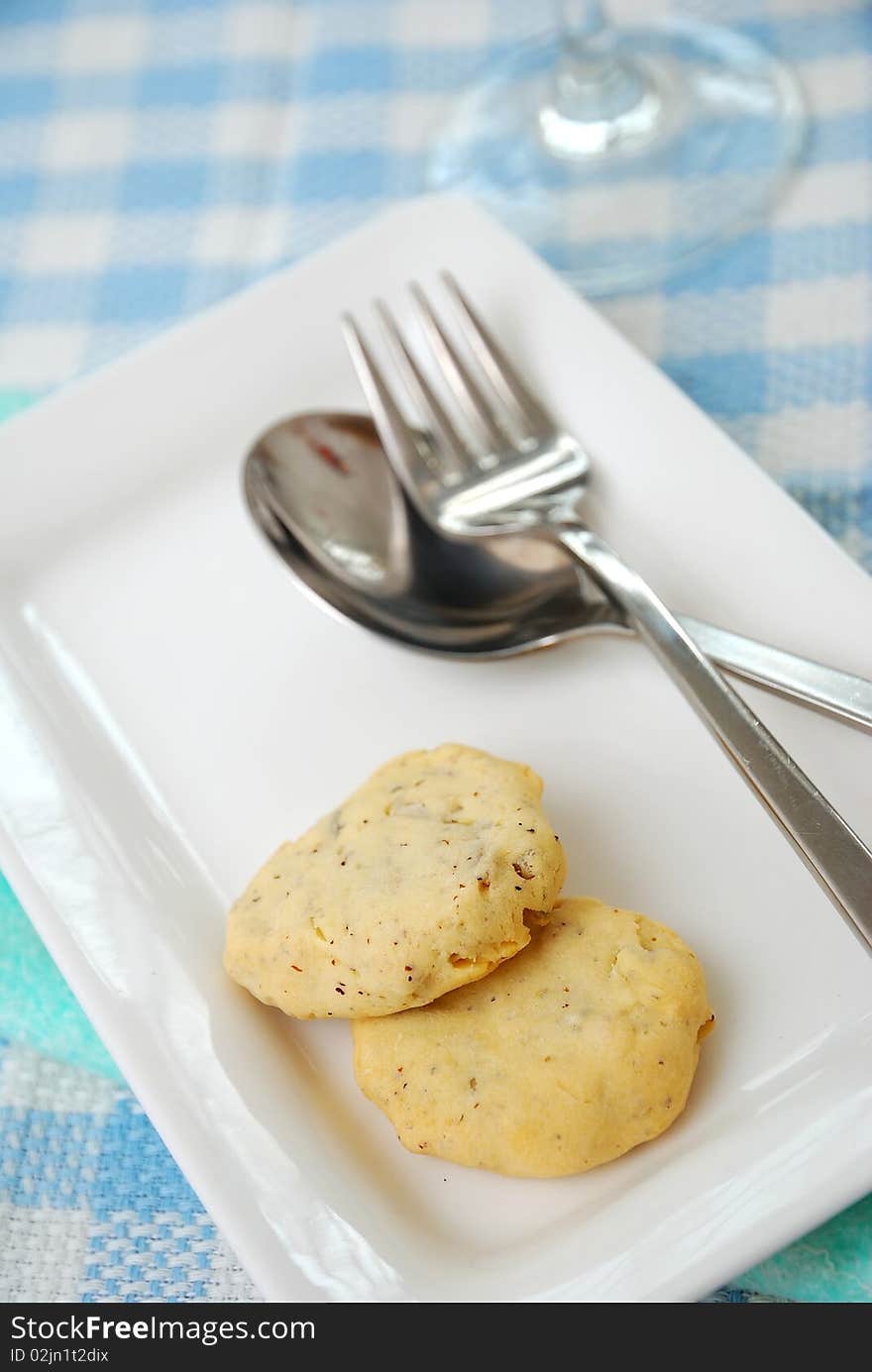 Healthy cookies on plate with utensils