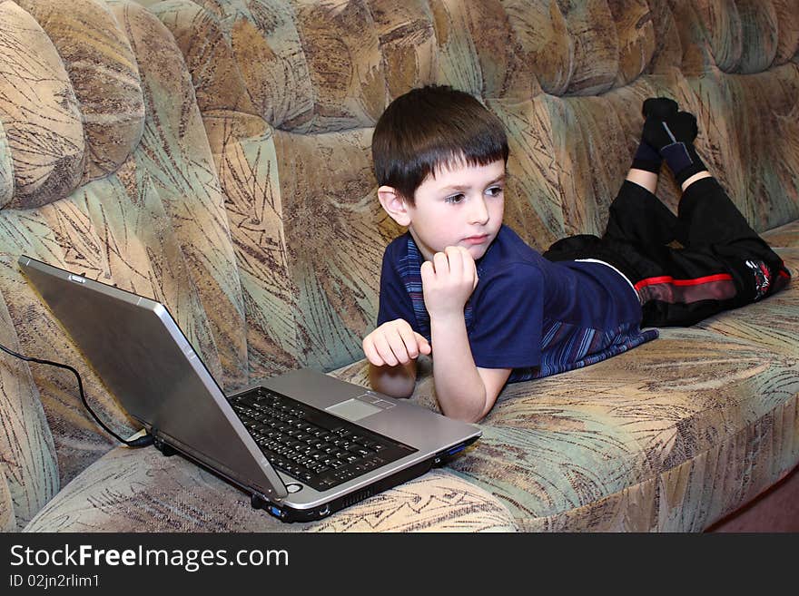 Small Boy With Notebook