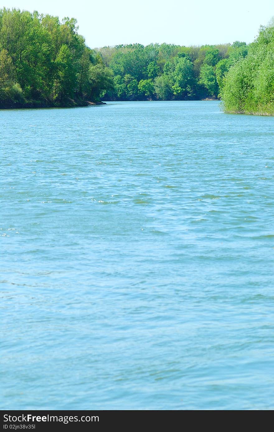 Summer landscape. River, riverside and trees. Summer landscape. River, riverside and trees