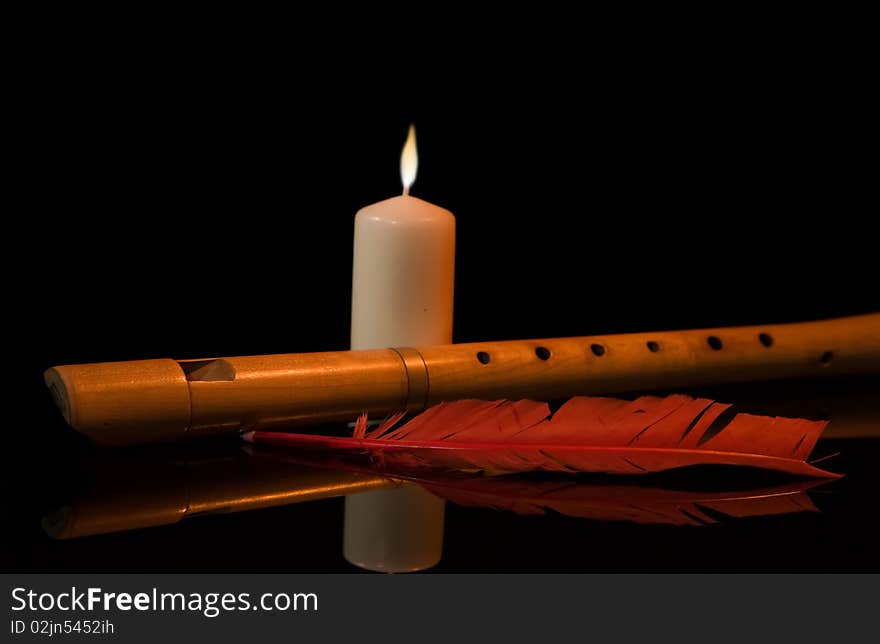 Still Life with flute,  candle and red feather