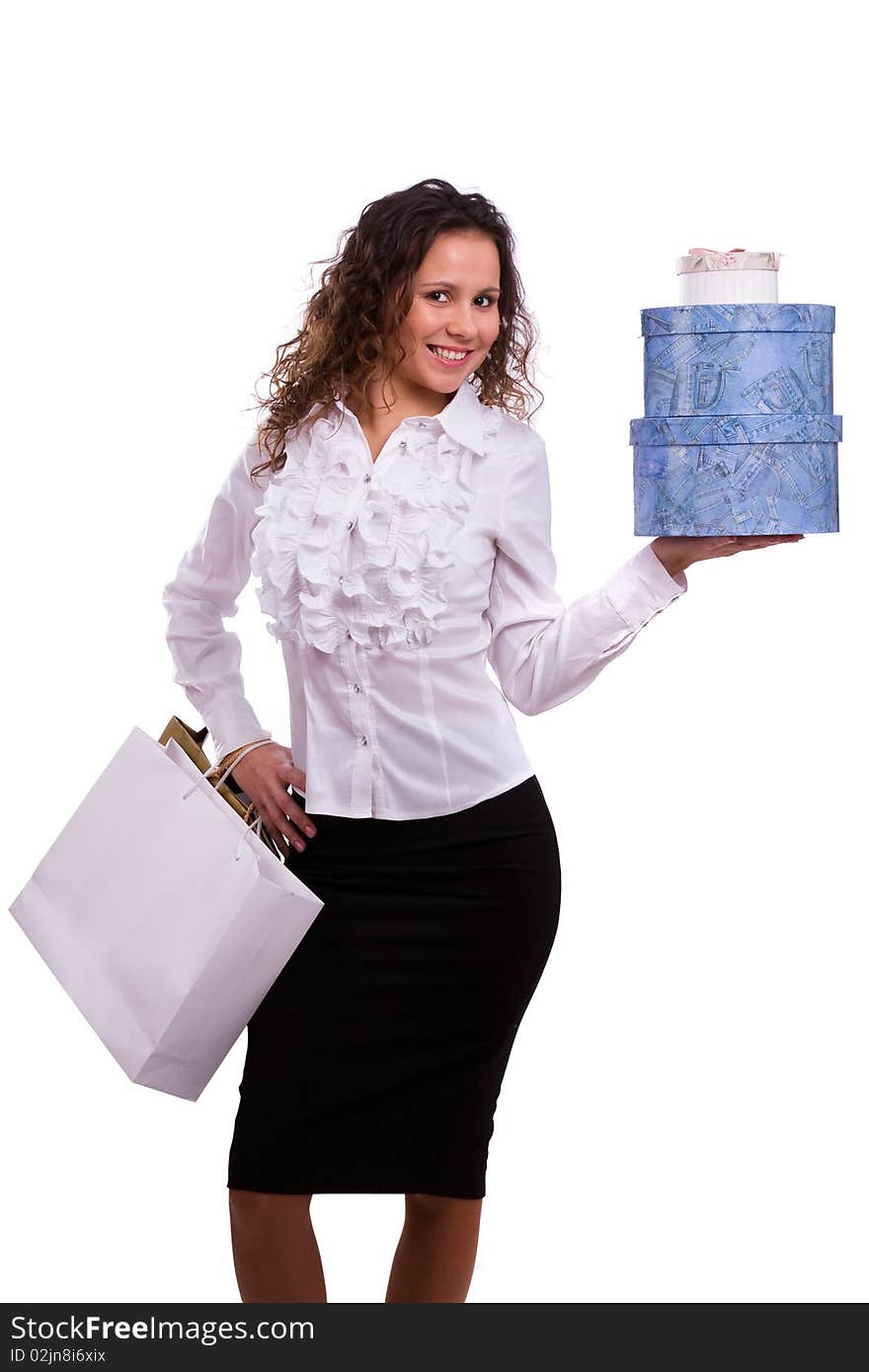 Young woman holding several bags. Excited Shopping Woman isolated on white