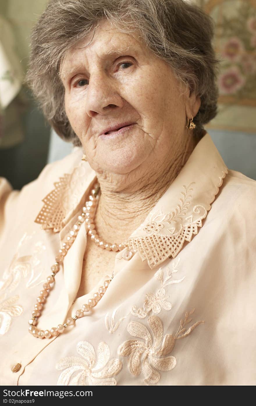 Smiling woman in age of 85 years