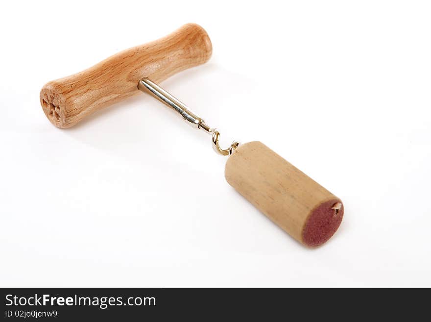 Wooden corkage, utensil to open bottles with cork against white background