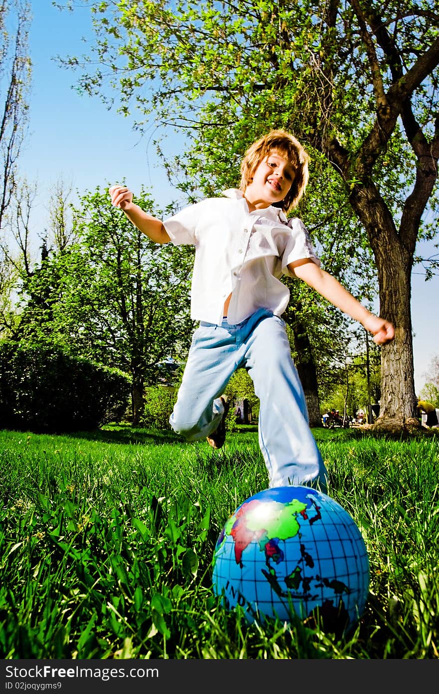 Cheerful boy with ball on walk. Cheerful boy with ball on walk