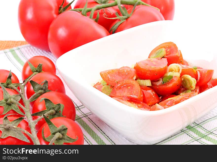 Salad of tomatoes with springonions