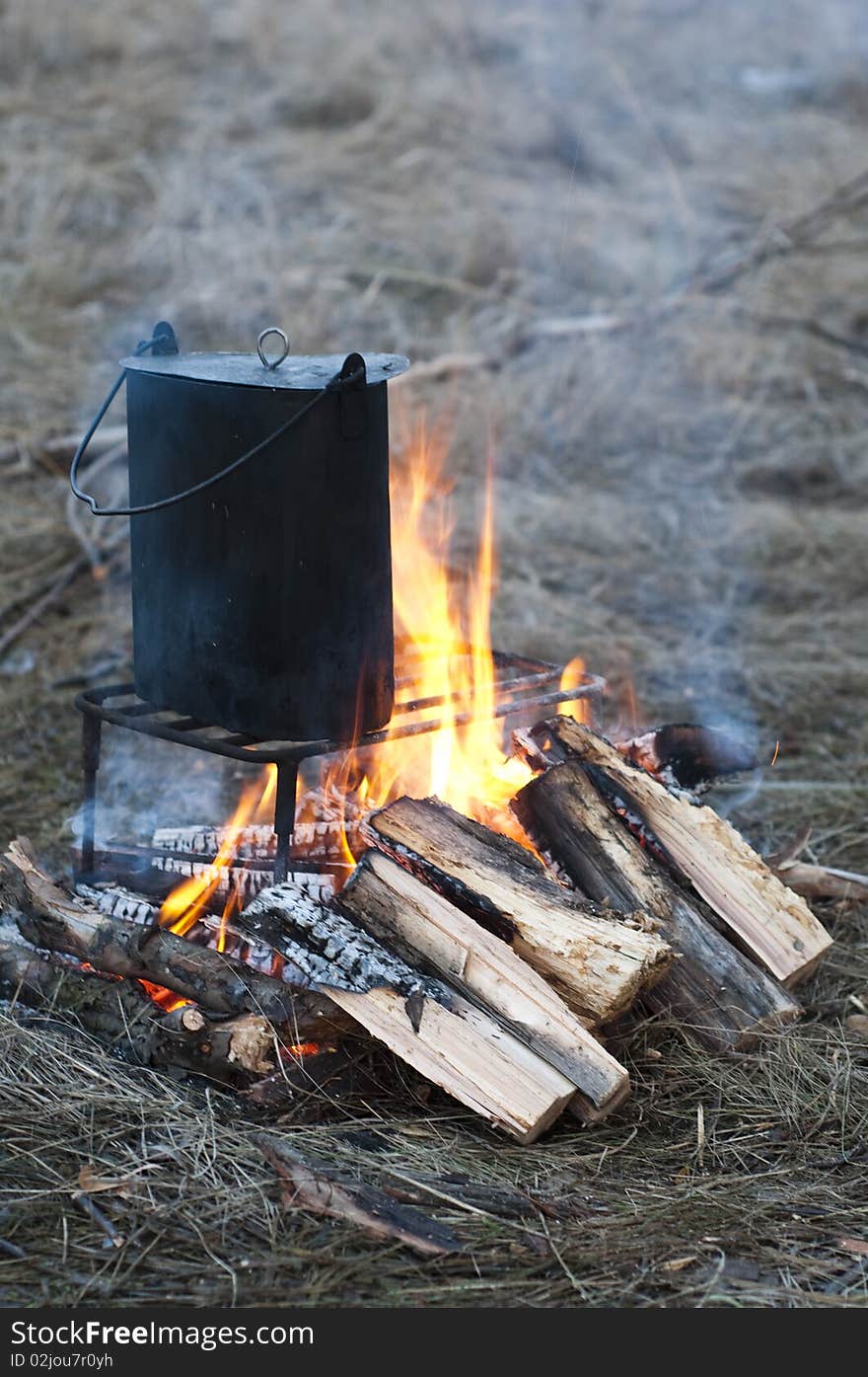 Cooking in a pot on the bonfire