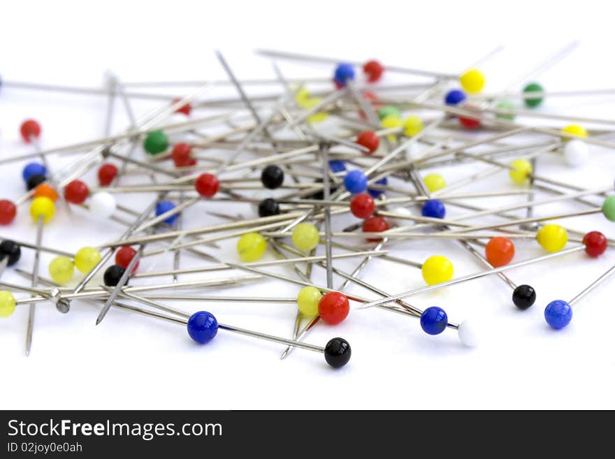 Pins On A White Background